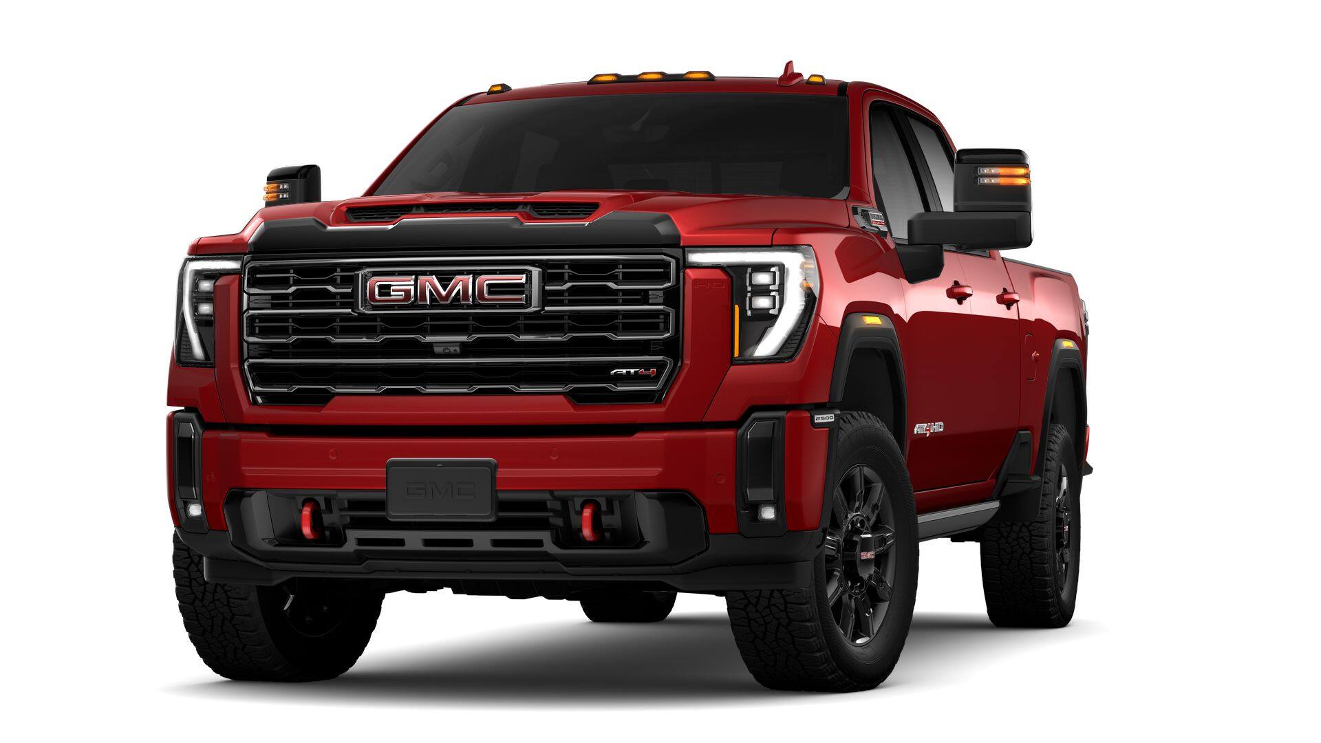 2026 GMC Sierra 2500 HD AT4 in Volcanic Red Tintcoat — front three-quarter view