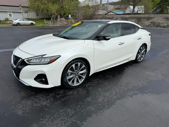 2022 Nissan Maxima Platinum in Pearl White Trico — front three-quarter view